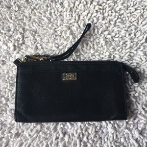 Coach black leather wristlet with zip closure